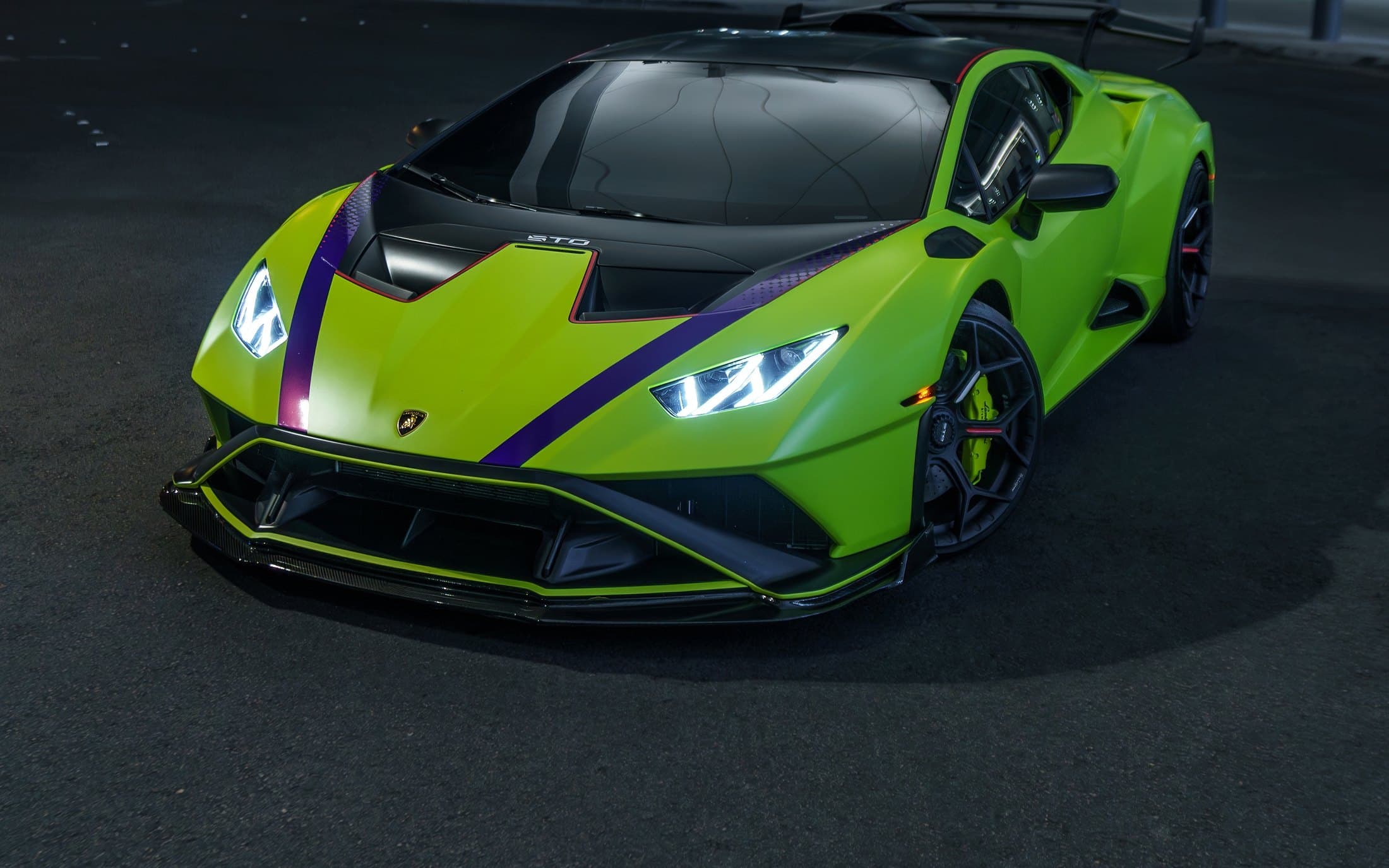 Lime green Lamborghini Huracán STO at night in Las Vegas