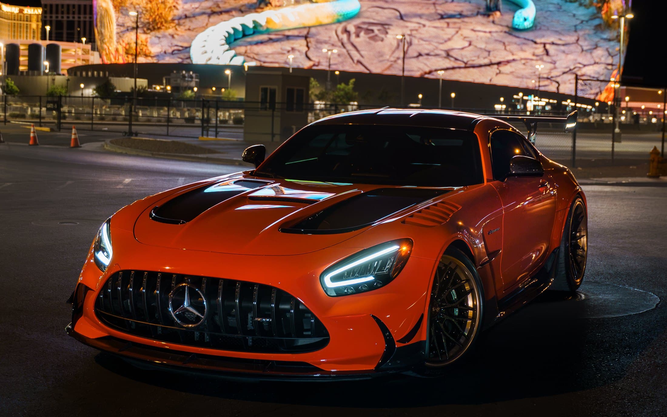 Orange Mercedes-AMG GT Black Series at night on the Las Vegas Strip