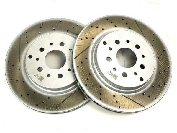 New drilled brake rotors staged for installation