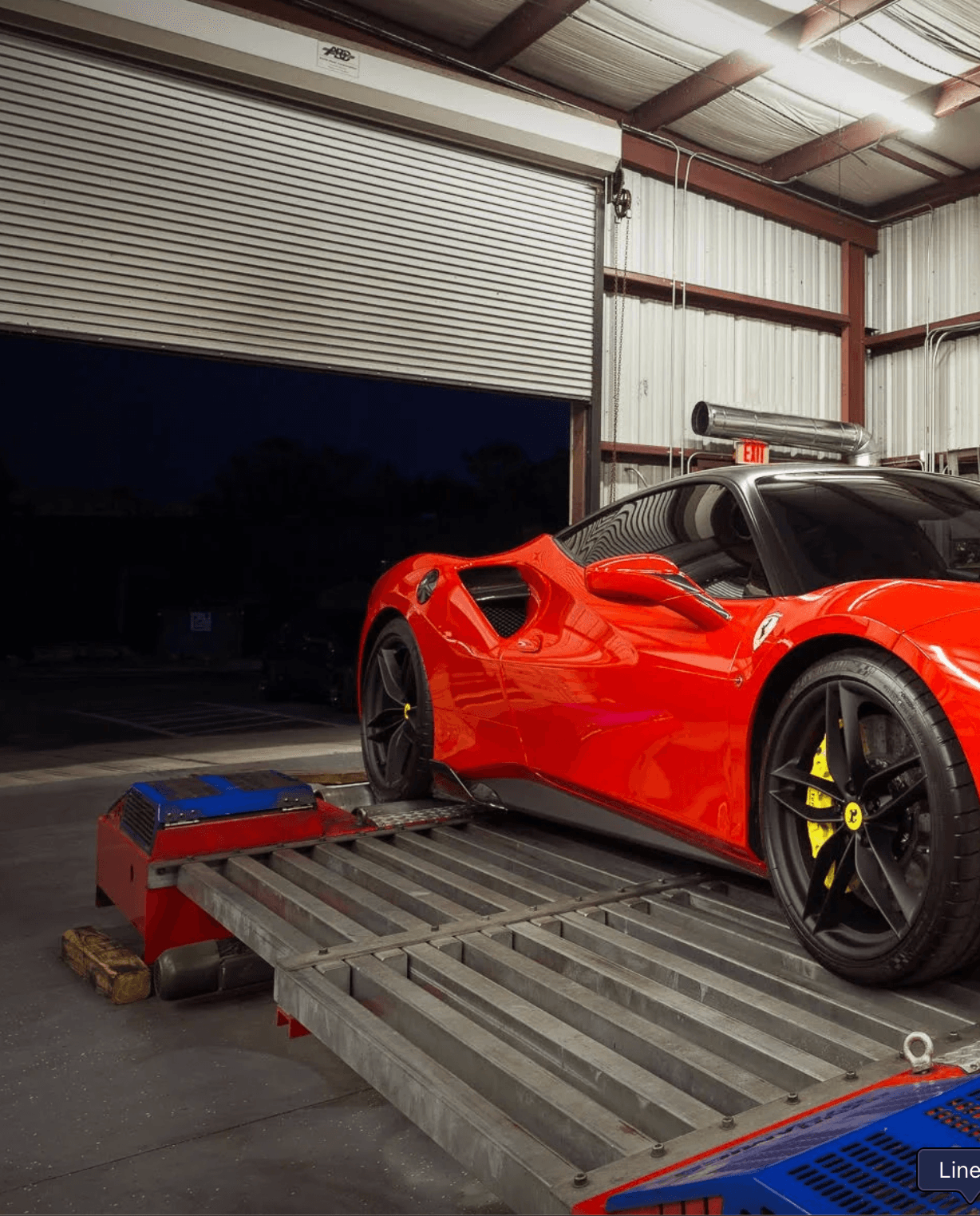 Red Ferrari on the dynamometer at Formula Dynamics